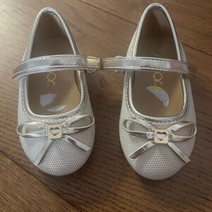 Cute gold sparkly ballet type shoes for toddler.